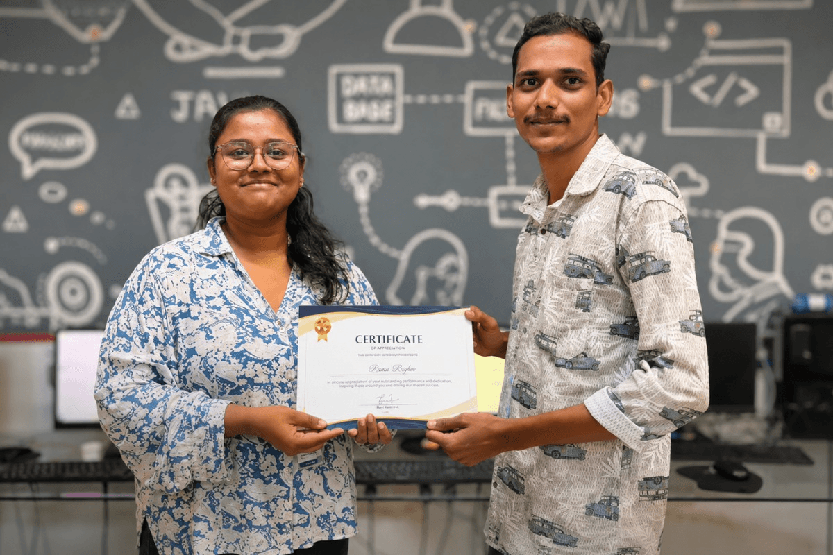 Career Circle graduate receiving their MERN Stack completion certificate